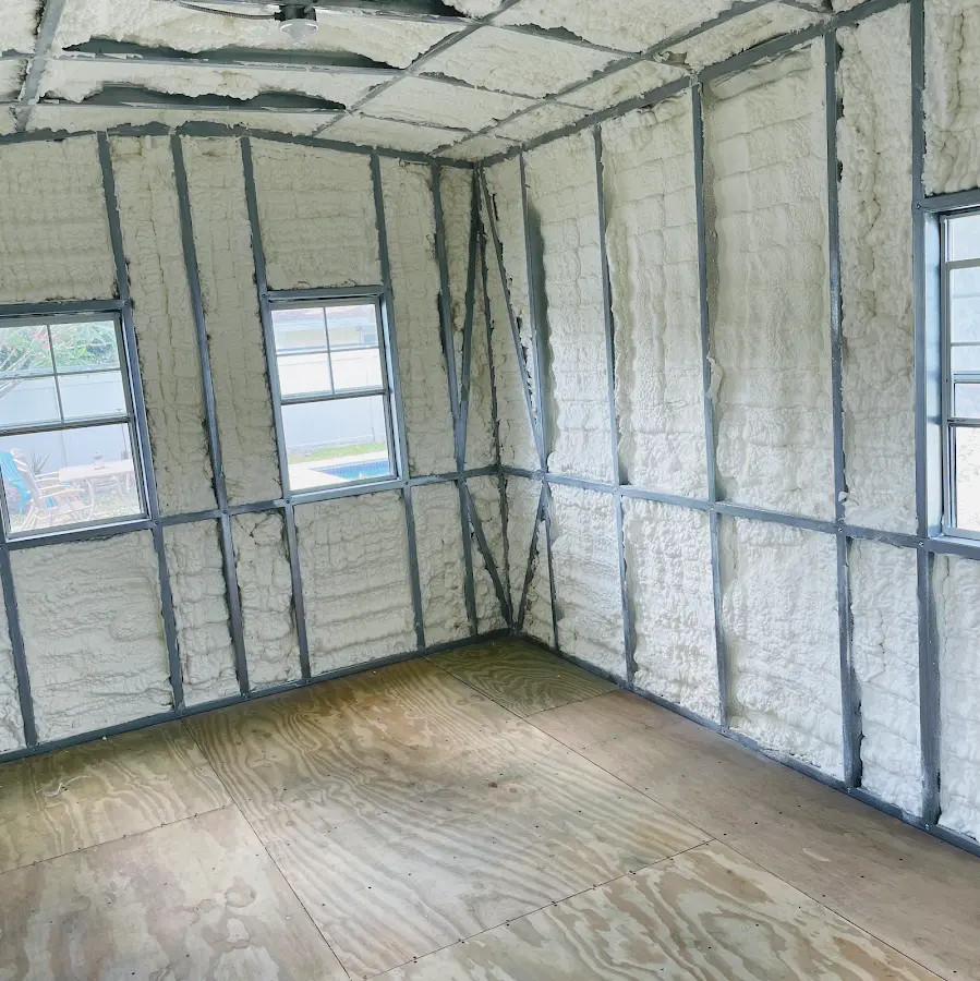 Closed-cell spray foam insulation applied to wall cavities in a residential project in Cleveland
